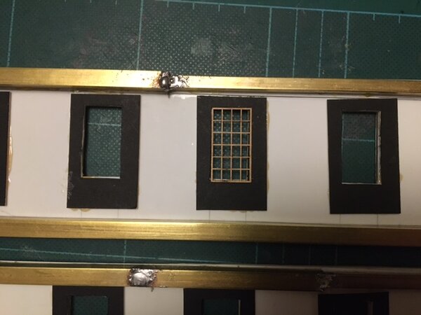 The card “frames” were added to the rear of the windows  and trimmed for a good fit of the windows.