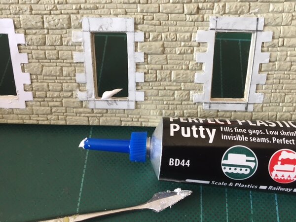 use De Luxe Materials Perfect Plastic Putty to fill in any gaps.  I found this material far more convenient to work with than Milliput filler as it is already mixed and easy to apply.